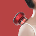 Red neck massager being used on a person's neck against a red background