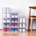 Set of stackable boxes displaying sneakers inside with clean visibility