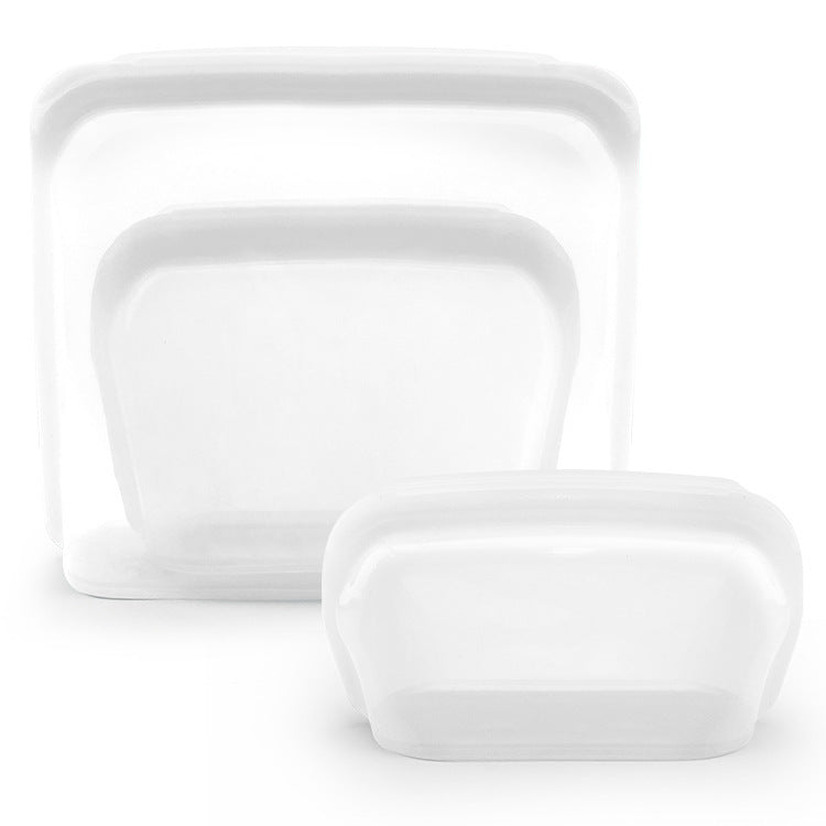 Set of three white ceramic plates on a white background