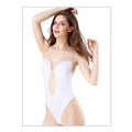 Woman wearing a white bodysuit against a white background