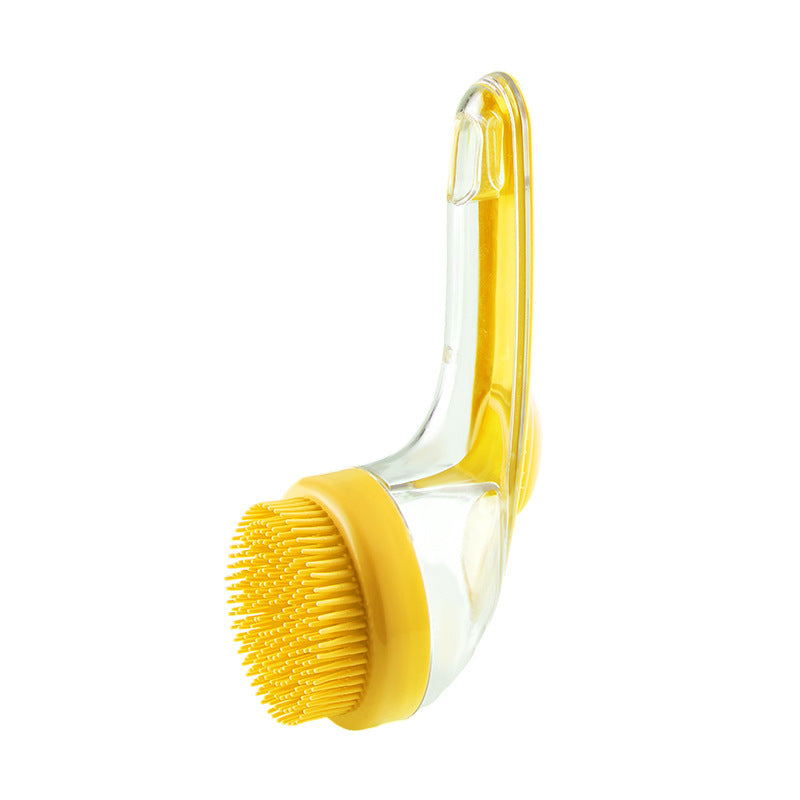 Long handle yellow pet bath brush with clear handle on a white background